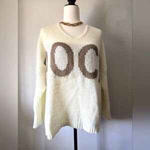 CEZELE "ROCK" Cream Wool Blend Knit Realxed Fit V Neck Sweater. Size Medium